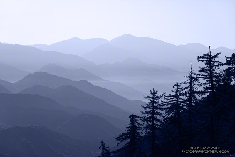 San Gabriel Mountains morning. Hazy view extending from the West Fork San Gabriel River Canyon to the East Fork and Mt. Baldy area peaks.