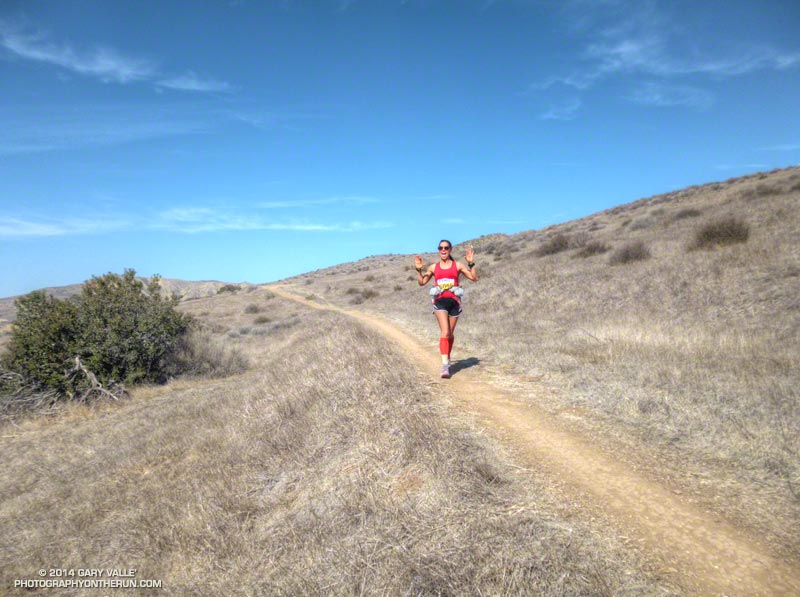 A positive, upbeat attitude goes a long way in a 50K! Descending to the Las Llajas aid station.