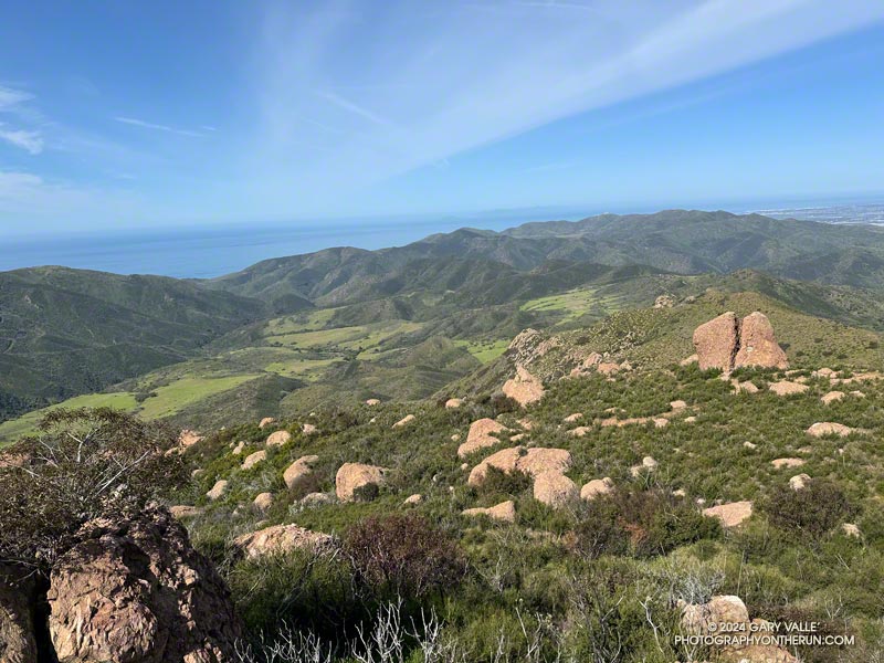 Chamberlain Rock and Serrano Valley from the Chamberlain segment of the Backbone Trail. Mugu Peak, Laguna Peak and La Jolla Valley are in the distance.