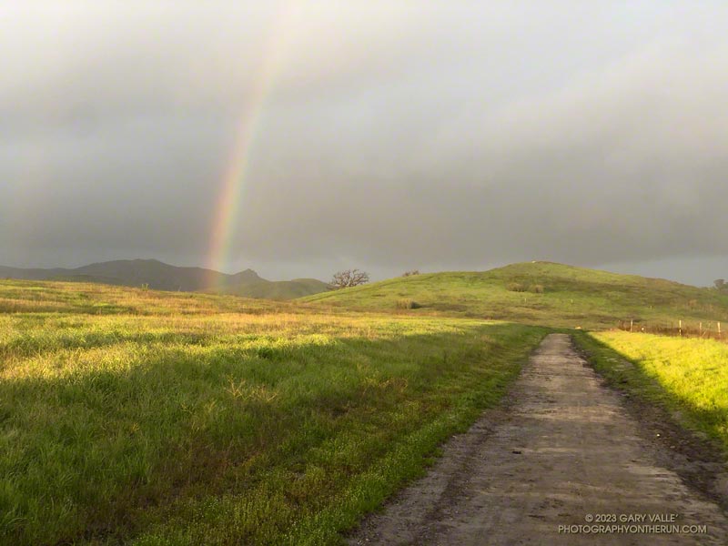 Running in the rain and chasing a rainbow on Lasky Mesa.