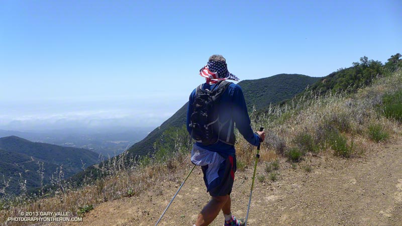 Kevin ponders Romero Canyon from near the top of Romero Road.