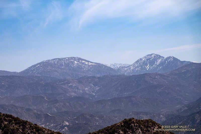 Hazy view of the snow on Waterman Mountain and Twin Peaks. April 16, 2023.