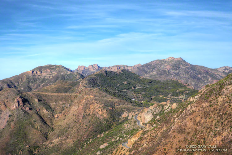 The Backbone Trail west of the Yerba Buena Road Crossing with Sandstone Peak on the right and Triunfo Lookout on the left. Sandstone Peak (3111') is the highest peak in the Santa Monica Mountains.