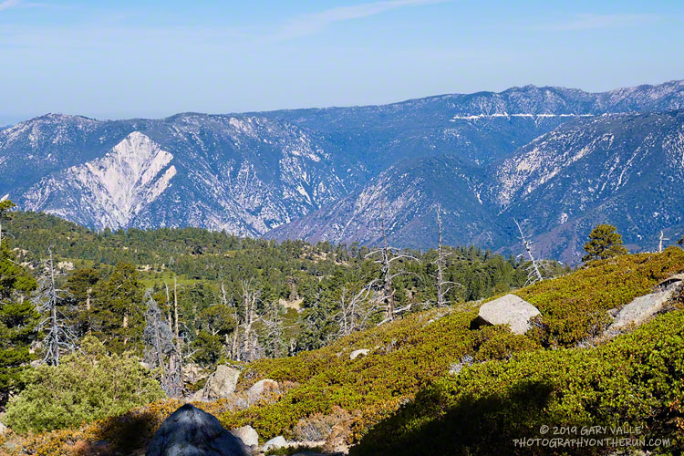 Keller Peak, Slide Peak, Bear Canyon, and the Rim of the World Highway from an elevation of 8930' on the Divide Trail. Bear Canyon is crossed by ultrarunners circuiting Big Bear Lake during the Kodiak 100 Mile run.