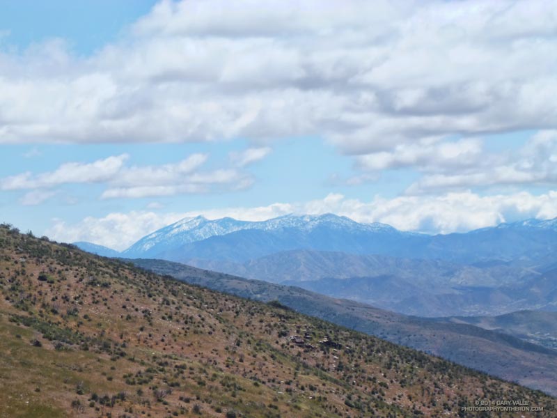 Snow in the Angeles high country. From left to right on the crest: Mt. Baden-Powell, Mt. Burnham, Throop Peak (in clouds) and Mt. Hawkins. From Sierra Pelona Ridge.
