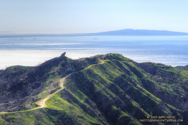 Mesa Peak Mtwy with Palos Verdes Penisula in the distance.