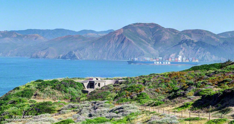 Container ship outbound from the Golden Gate. Battery Crosby in the foreground; Marin Headlands in the distance.