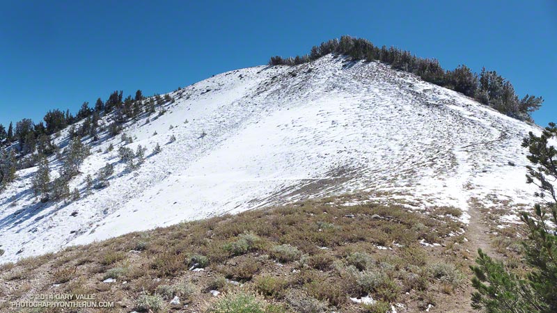 Looking back at the snowy descent to Deadman Pass.
