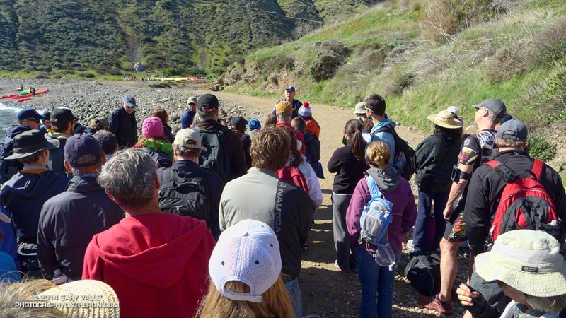 An orientation is provided by the NPS after landing, briefly discussing the island's unique features and creatures.