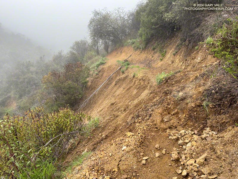 A damaged section of the Reseda trailhead - Mulholland connector trail. February 17, 2024.